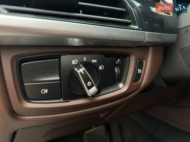 Чорний БМВ Х5, об'ємом двигуна 3 л та пробігом 126 тис. км за 31000 $, фото 39 на Automoto.ua