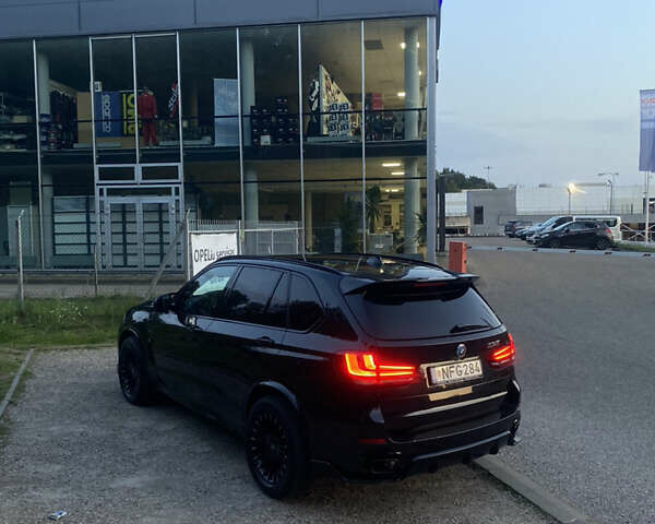 Черный БМВ Х5, объемом двигателя 2 л и пробегом 330 тыс. км за 31500 $, фото 6 на Automoto.ua