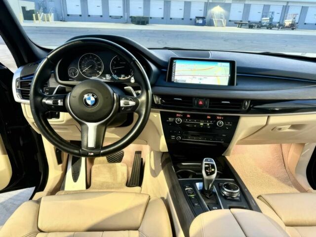Чорний БМВ Х5, об'ємом двигуна 3 л та пробігом 100 тис. км за 15900 $, фото 9 на Automoto.ua