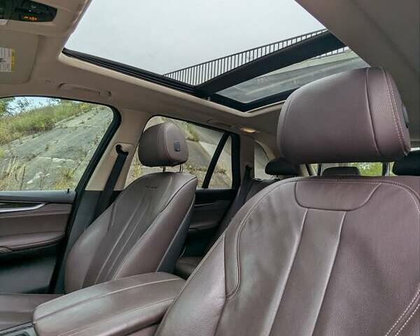 Черный БМВ Х5, объемом двигателя 3 л и пробегом 314 тыс. км за 16700 $, фото 40 на Automoto.ua