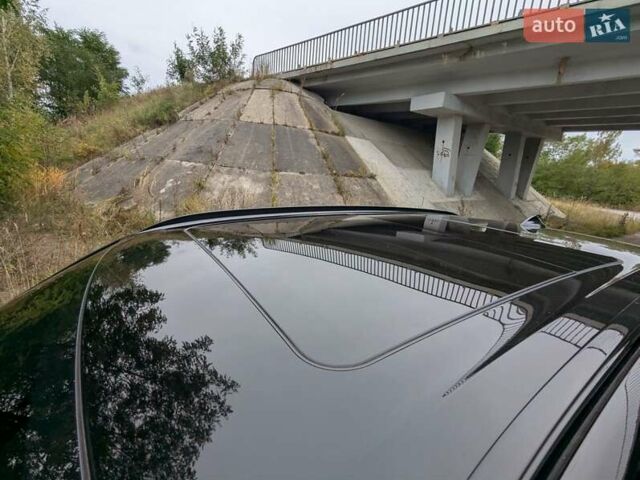 Черный БМВ Х5, объемом двигателя 3 л и пробегом 314 тыс. км за 16700 $, фото 47 на Automoto.ua