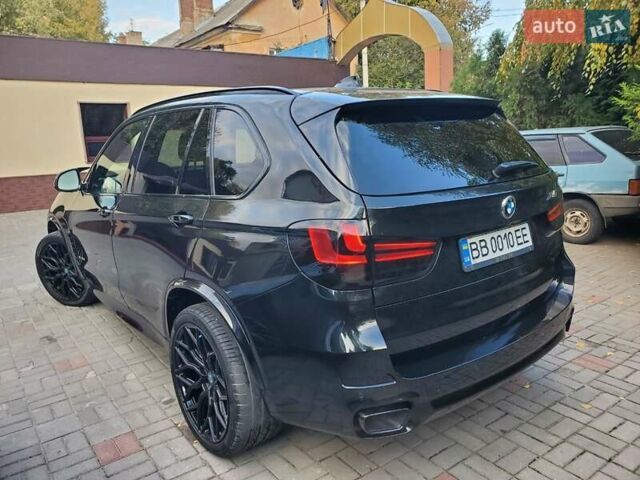 Черный БМВ Х5, объемом двигателя 3 л и пробегом 210 тыс. км за 29900 $, фото 2 на Automoto.ua