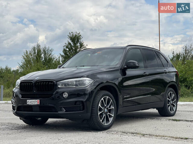 Черный БМВ Х5, объемом двигателя 2 л и пробегом 204 тыс. км за 26900 $, фото 1 на Automoto.ua
