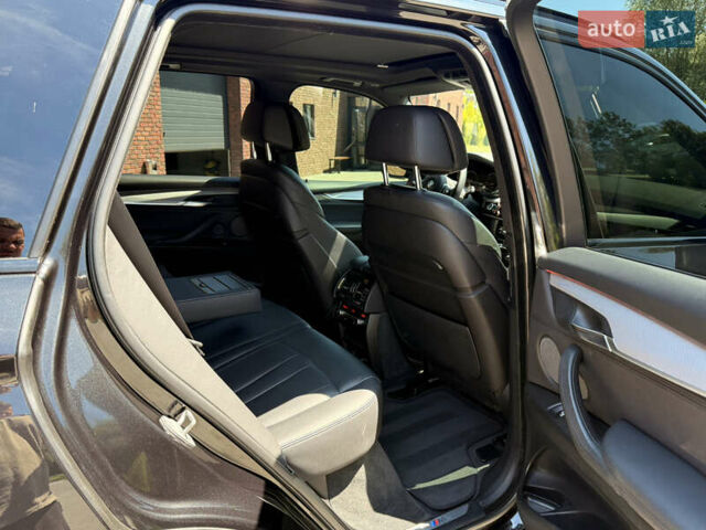 Черный БМВ Х5, объемом двигателя 3 л и пробегом 130 тыс. км за 39500 $, фото 20 на Automoto.ua