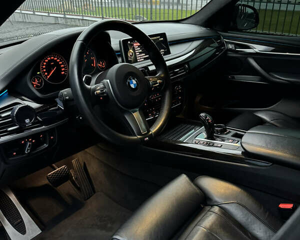 Черный БМВ Х5, объемом двигателя 3 л и пробегом 141 тыс. км за 41000 $, фото 8 на Automoto.ua