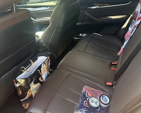 Черный БМВ Х5, объемом двигателя 3 л и пробегом 48 тыс. км за 41500 $, фото 4 на Automoto.ua