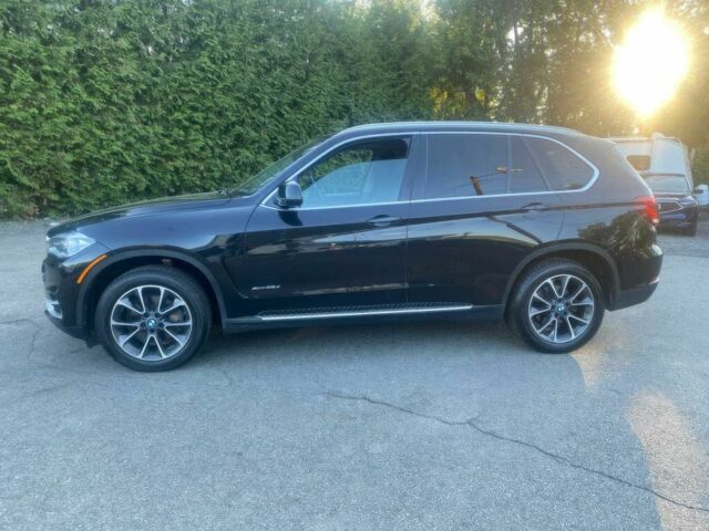 Чорний БМВ Х5, об'ємом двигуна 3 л та пробігом 90 тис. км за 16700 $, фото 5 на Automoto.ua