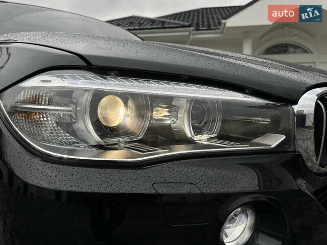 Черный БМВ Х5, объемом двигателя 3 л и пробегом 83 тыс. км за 23800 $, фото 6 на Automoto.ua