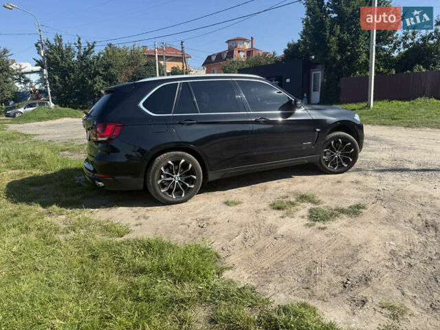 Черный БМВ Х5, объемом двигателя 3 л и пробегом 107 тыс. км за 25500 $, фото 2 на Automoto.ua