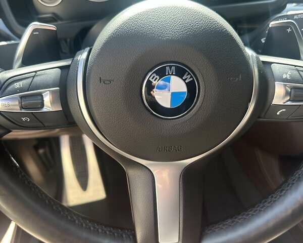 Черный БМВ Х5, объемом двигателя 3 л и пробегом 48 тыс. км за 41500 $, фото 1 на Automoto.ua