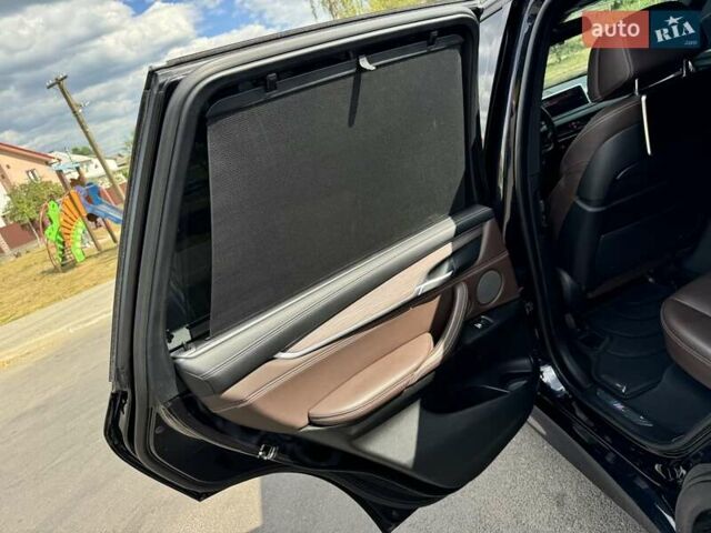 Черный БМВ Х5, объемом двигателя 4.39 л и пробегом 117 тыс. км за 24200 $, фото 10 на Automoto.ua