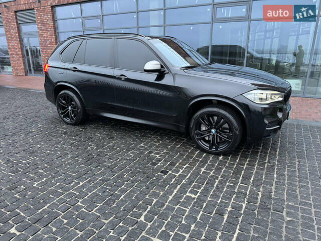 Черный БМВ Х5, объемом двигателя 3 л и пробегом 141 тыс. км за 41000 $, фото 1 на Automoto.ua