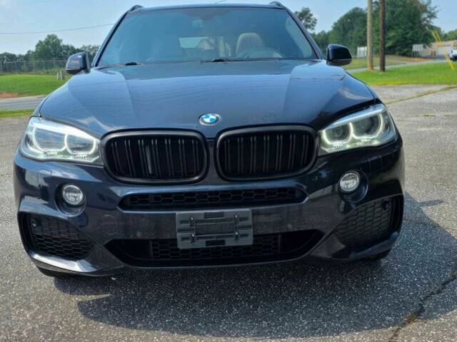 Чорний БМВ Х5, об'ємом двигуна 4.4 л та пробігом 85 тис. км за 6900 $, фото 1 на Automoto.ua