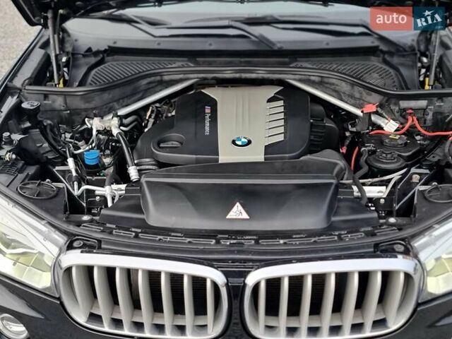 Черный БМВ Х5, объемом двигателя 3 л и пробегом 258 тыс. км за 34700 $, фото 83 на Automoto.ua