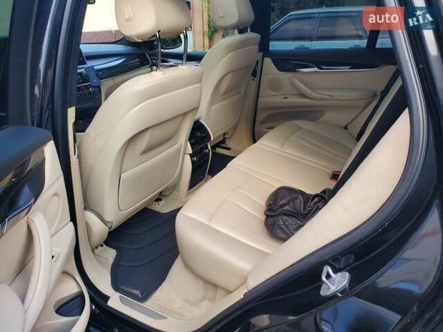 Черный БМВ Х5, объемом двигателя 3 л и пробегом 210 тыс. км за 29900 $, фото 4 на Automoto.ua