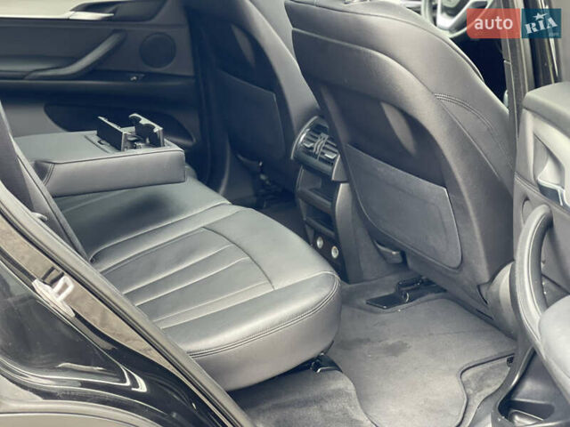 Черный БМВ Х5, объемом двигателя 2 л и пробегом 204 тыс. км за 26900 $, фото 61 на Automoto.ua