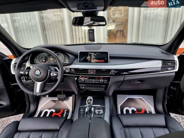 Черный БМВ Х5, объемом двигателя 3 л и пробегом 258 тыс. км за 34700 $, фото 74 на Automoto.ua