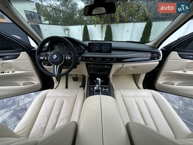 Черный БМВ Х5, объемом двигателя 3 л и пробегом 83 тыс. км за 23800 $, фото 60 на Automoto.ua