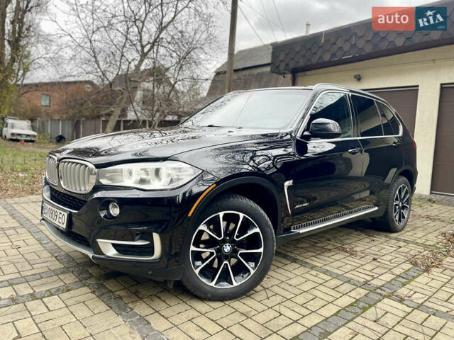 Черный БМВ Х5, объемом двигателя 3 л и пробегом 235 тыс. км за 17995 $, фото 1 на Automoto.ua