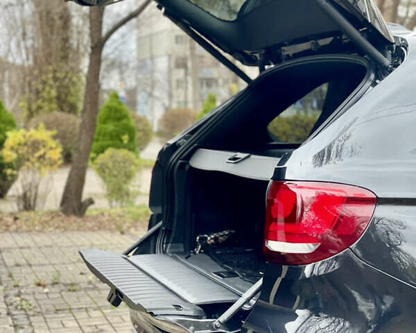 Черный БМВ Х5, объемом двигателя 3 л и пробегом 235 тыс. км за 17995 $, фото 53 на Automoto.ua