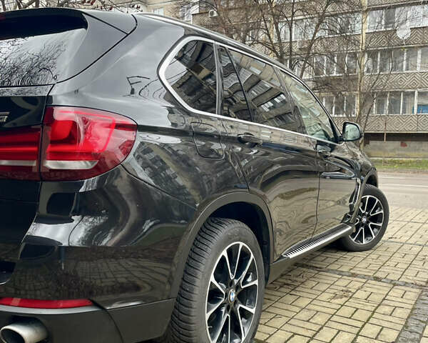 Черный БМВ Х5, объемом двигателя 3 л и пробегом 235 тыс. км за 17995 $, фото 2 на Automoto.ua