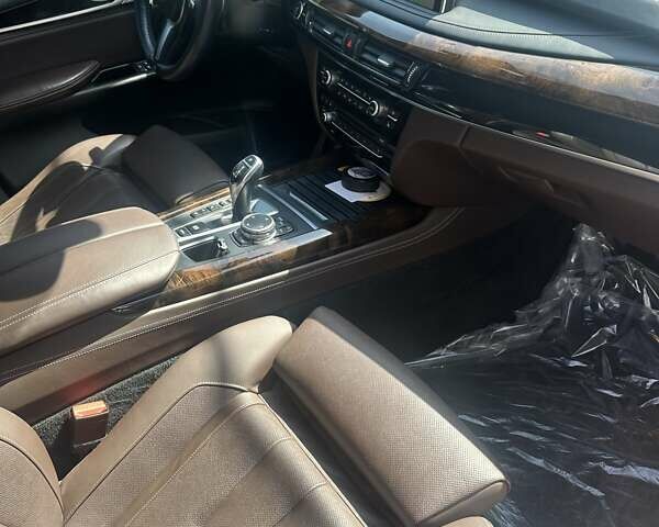 Черный БМВ Х5, объемом двигателя 3 л и пробегом 48 тыс. км за 41500 $, фото 2 на Automoto.ua