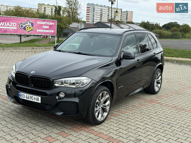 Черный БМВ Х5, объемом двигателя 2.99 л и пробегом 193 тыс. км за 30000 $, фото 3 на Automoto.ua