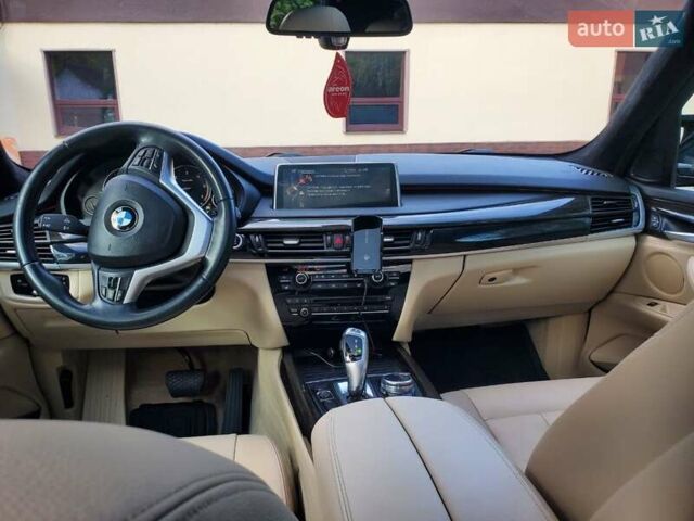 Черный БМВ Х5, объемом двигателя 3 л и пробегом 210 тыс. км за 29900 $, фото 1 на Automoto.ua