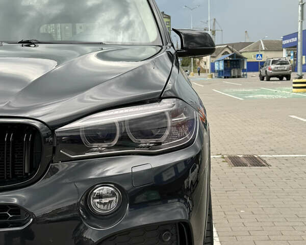 Черный БМВ Х5, объемом двигателя 3 л и пробегом 135 тыс. км за 20850 $, фото 4 на Automoto.ua