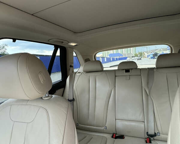 Черный БМВ Х5, объемом двигателя 3 л и пробегом 135 тыс. км за 20850 $, фото 32 на Automoto.ua