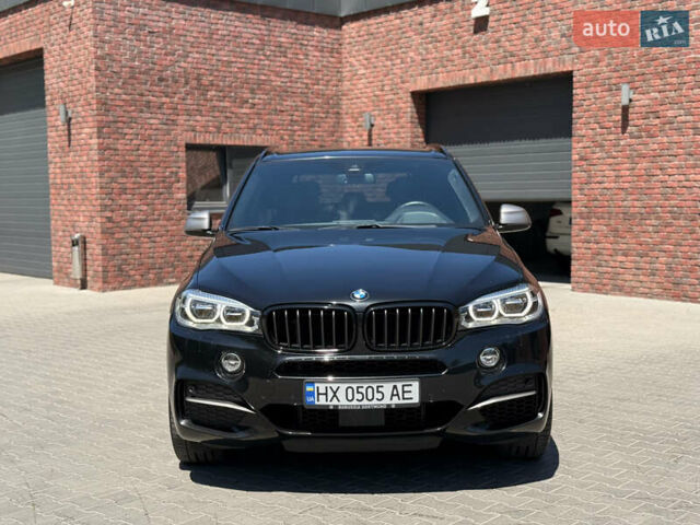 Черный БМВ Х5, объемом двигателя 3 л и пробегом 130 тыс. км за 39500 $, фото 2 на Automoto.ua