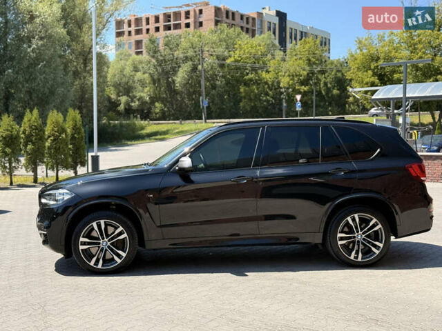 Черный БМВ Х5, объемом двигателя 3 л и пробегом 130 тыс. км за 39500 $, фото 3 на Automoto.ua