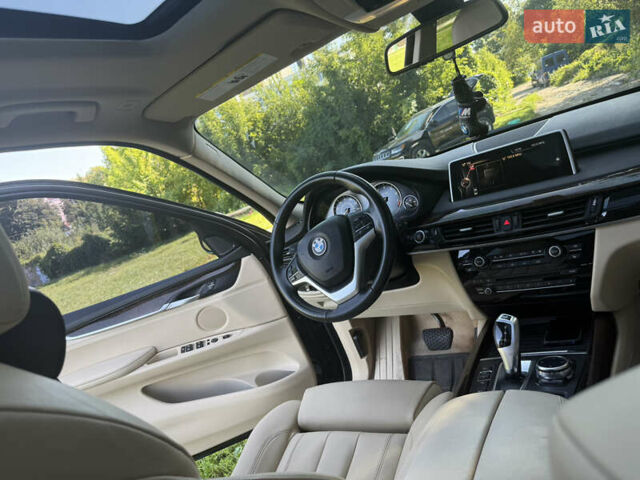 Черный БМВ Х5, объемом двигателя 3 л и пробегом 107 тыс. км за 25500 $, фото 4 на Automoto.ua