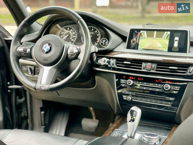 Черный БМВ Х5, объемом двигателя 3 л и пробегом 235 тыс. км за 17995 $, фото 32 на Automoto.ua