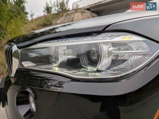 Черный БМВ Х5, объемом двигателя 3 л и пробегом 314 тыс. км за 16700 $, фото 50 на Automoto.ua