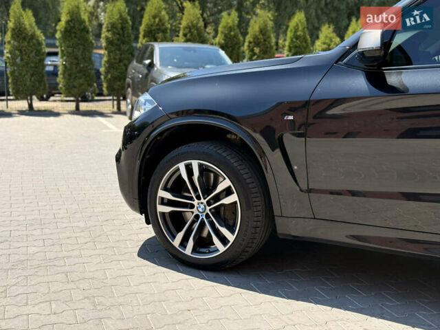 Черный БМВ Х5, объемом двигателя 3 л и пробегом 130 тыс. км за 39500 $, фото 4 на Automoto.ua