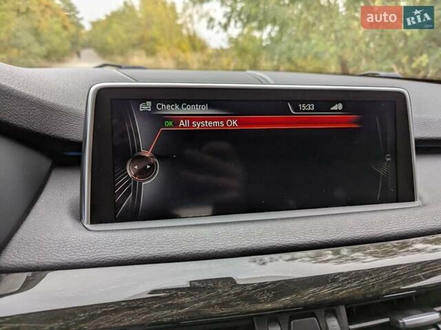 Черный БМВ Х5, объемом двигателя 3 л и пробегом 314 тыс. км за 16700 $, фото 28 на Automoto.ua