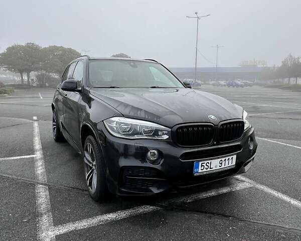 Черный БМВ Х5, объемом двигателя 3 л и пробегом 248 тыс. км за 23600 $, фото 1 на Automoto.ua