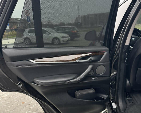 Чорний БМВ Х5, об'ємом двигуна 2.99 л та пробігом 242 тис. км за 23000 $, фото 17 на Automoto.ua