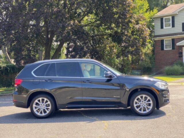 Черный БМВ Х5, объемом двигателя 3 л и пробегом 87 тыс. км за 11000 $, фото 6 на Automoto.ua