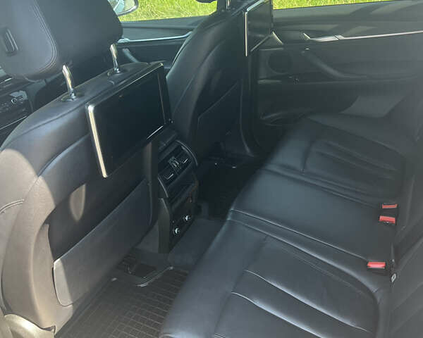 Черный БМВ Х5, объемом двигателя 2.99 л и пробегом 235 тыс. км за 23500 $, фото 5 на Automoto.ua