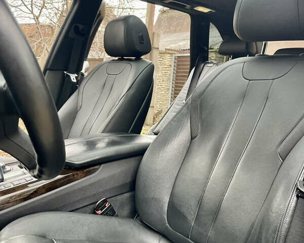 Черный БМВ Х5, объемом двигателя 3 л и пробегом 235 тыс. км за 17995 $, фото 49 на Automoto.ua