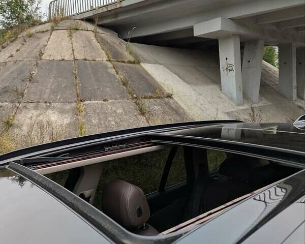 Черный БМВ Х5, объемом двигателя 3 л и пробегом 314 тыс. км за 16700 $, фото 49 на Automoto.ua