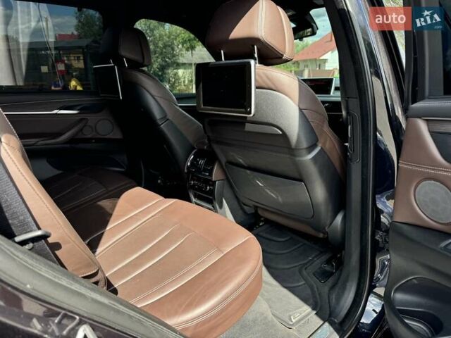 Черный БМВ Х5, объемом двигателя 4.39 л и пробегом 117 тыс. км за 24200 $, фото 11 на Automoto.ua