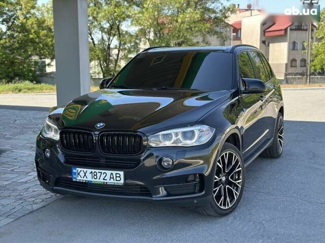 Чорний БМВ Х5, об'ємом двигуна 3 л та пробігом 233 тис. км за 23999 $, фото 1 на Automoto.ua