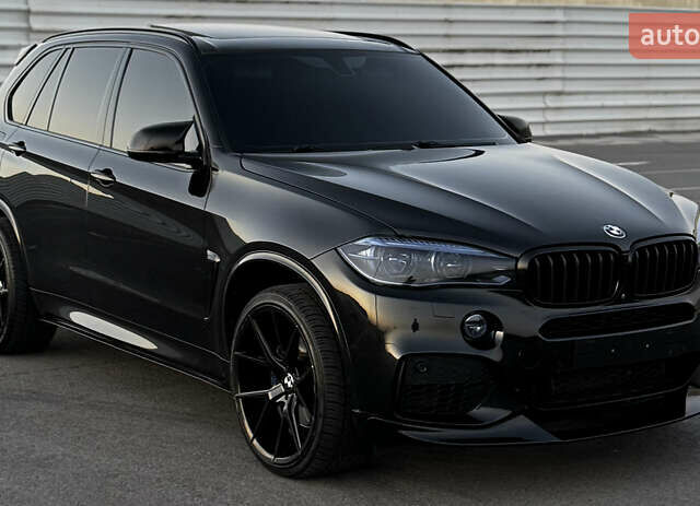 Чорний БМВ Х5, об'ємом двигуна 4.39 л та пробігом 204 тис. км за 26500 $, фото 2 на Automoto.ua