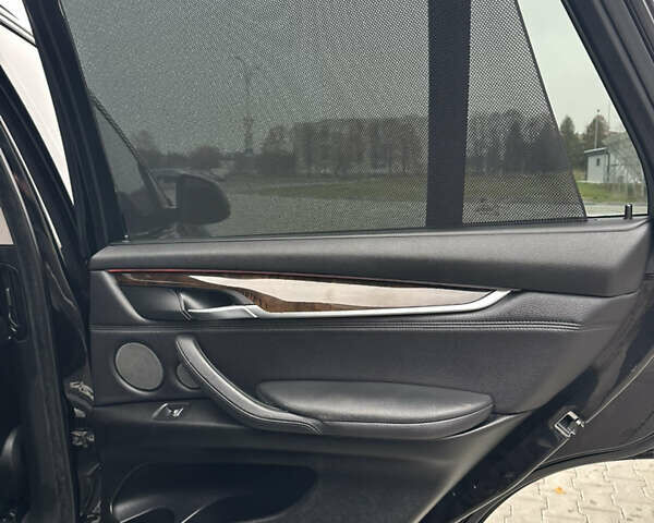 Чорний БМВ Х5, об'ємом двигуна 2.99 л та пробігом 242 тис. км за 23000 $, фото 19 на Automoto.ua