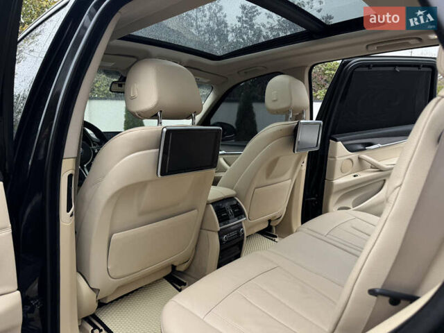 Черный БМВ Х5, объемом двигателя 3 л и пробегом 83 тыс. км за 23800 $, фото 33 на Automoto.ua