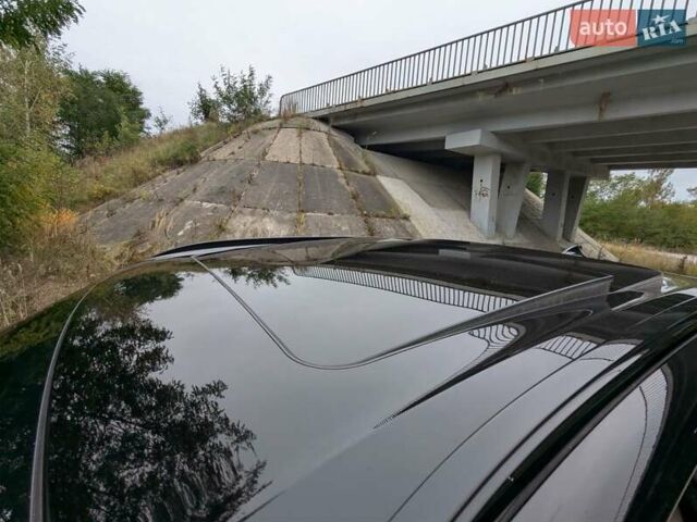 Черный БМВ Х5, объемом двигателя 3 л и пробегом 314 тыс. км за 16700 $, фото 48 на Automoto.ua