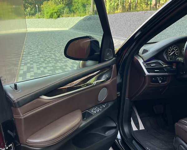 Чорний БМВ Х5, об'ємом двигуна 2.98 л та пробігом 255 тис. км за 29800 $, фото 9 на Automoto.ua